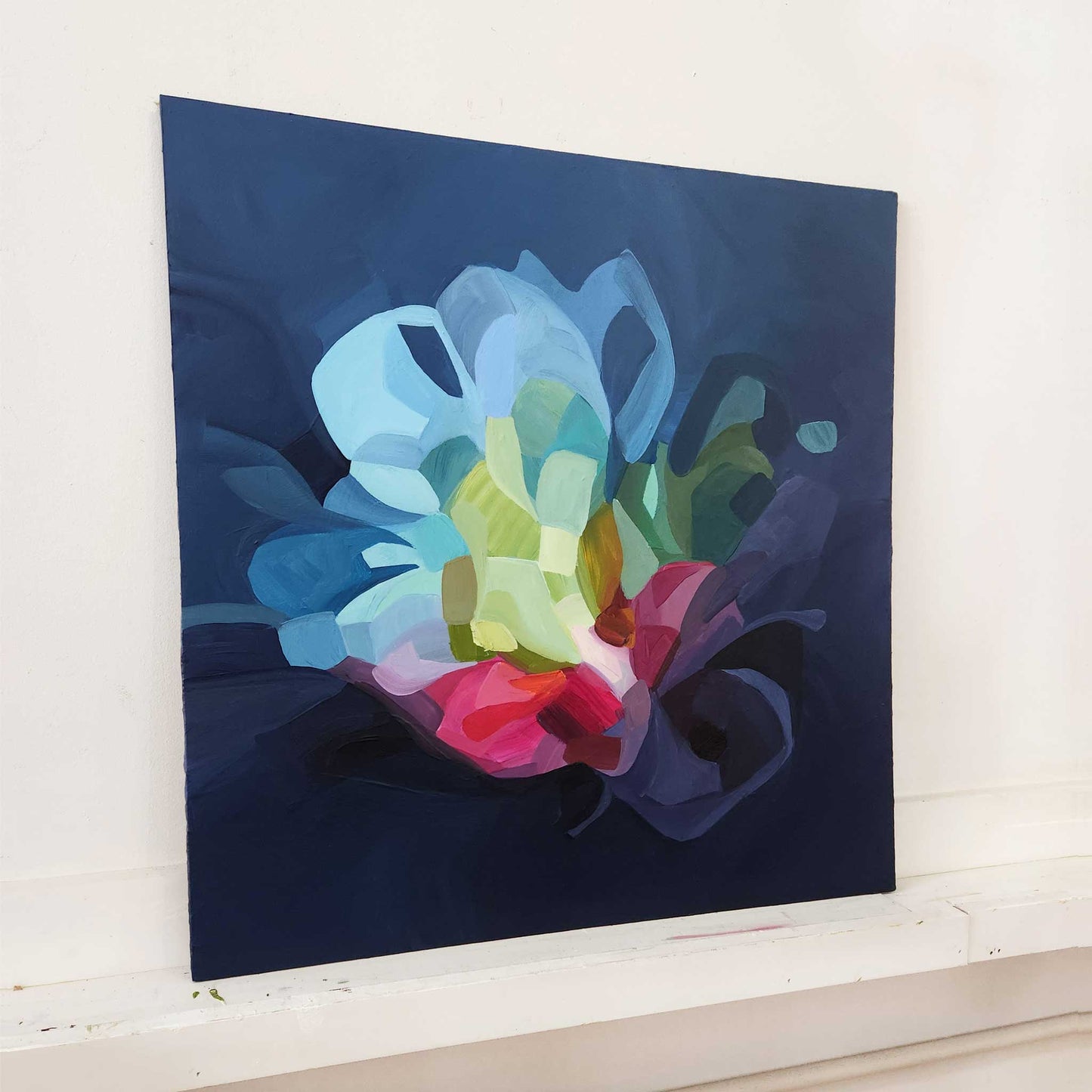 abstract navy acrylic painting in studio