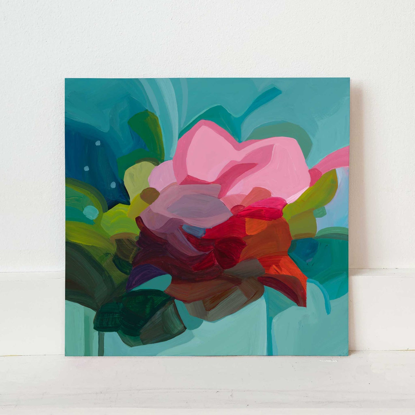 pink abstract flower painting on teal background