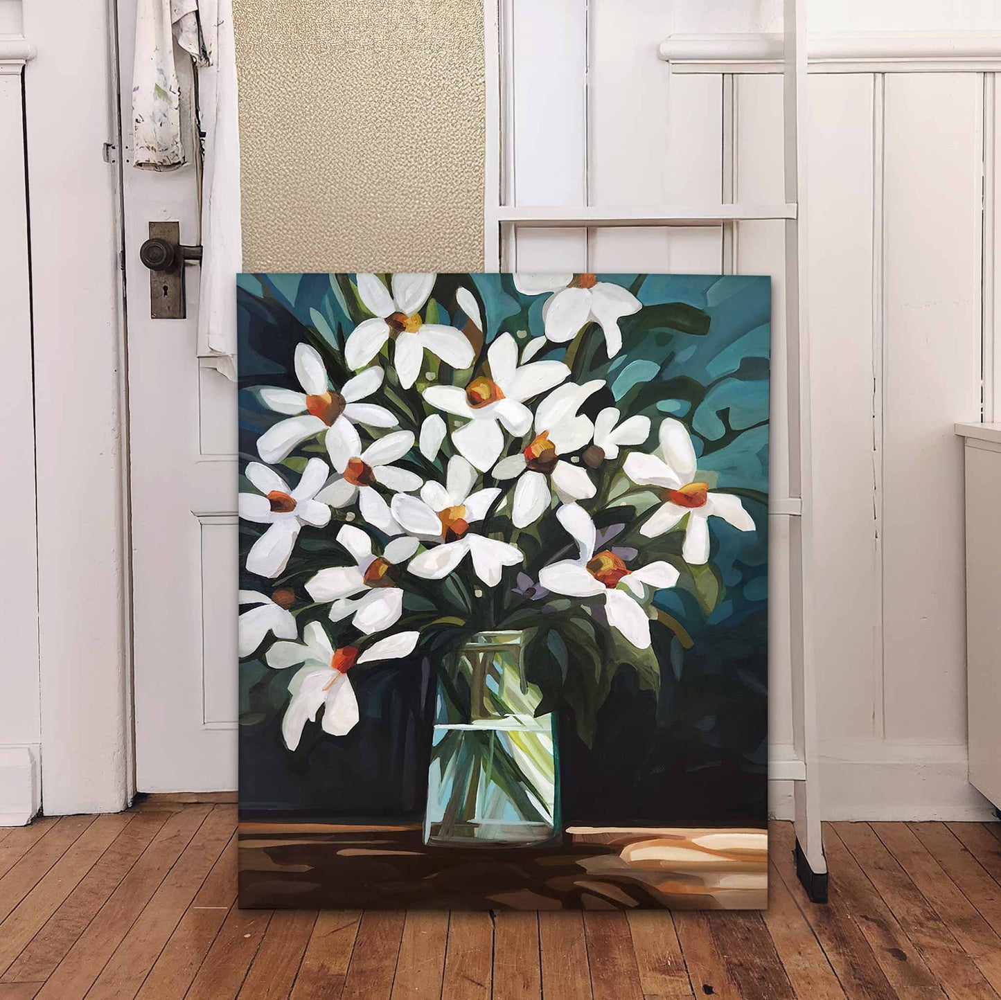 vertical painting of white daisies on a dark teal background in studio