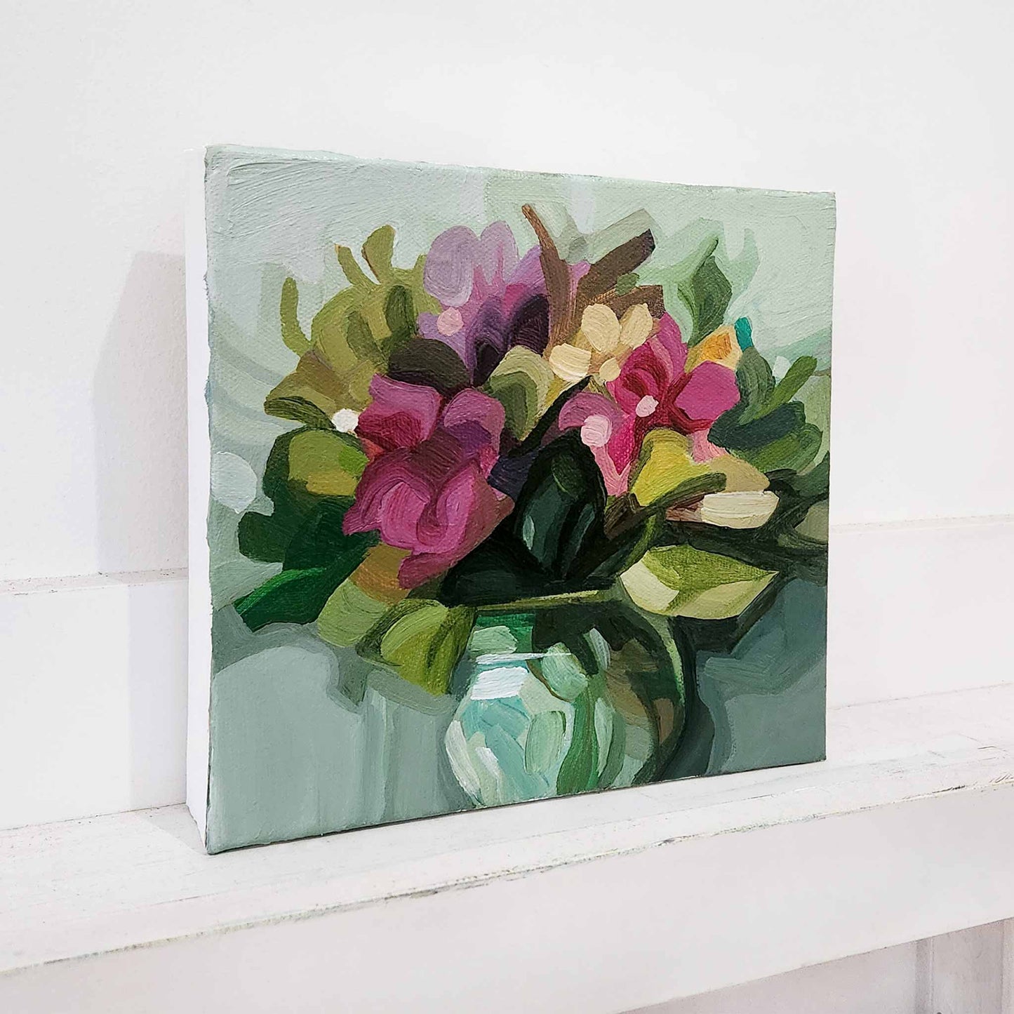 Vibrant floral arrangement painting with light green background, contemporary art by Susannah Bleasby