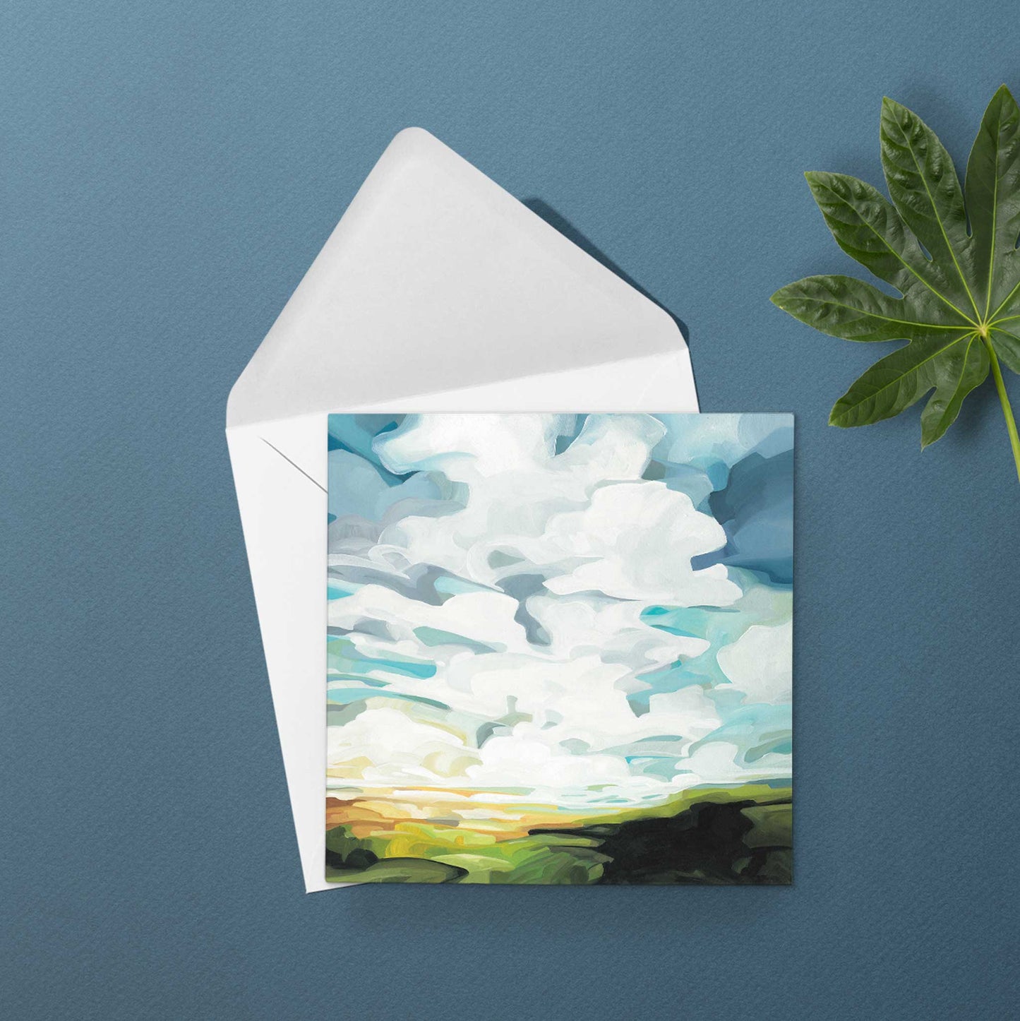 Nature inspired landscape greeting card with lush green hills, expressive clouds, and colourful countryside views