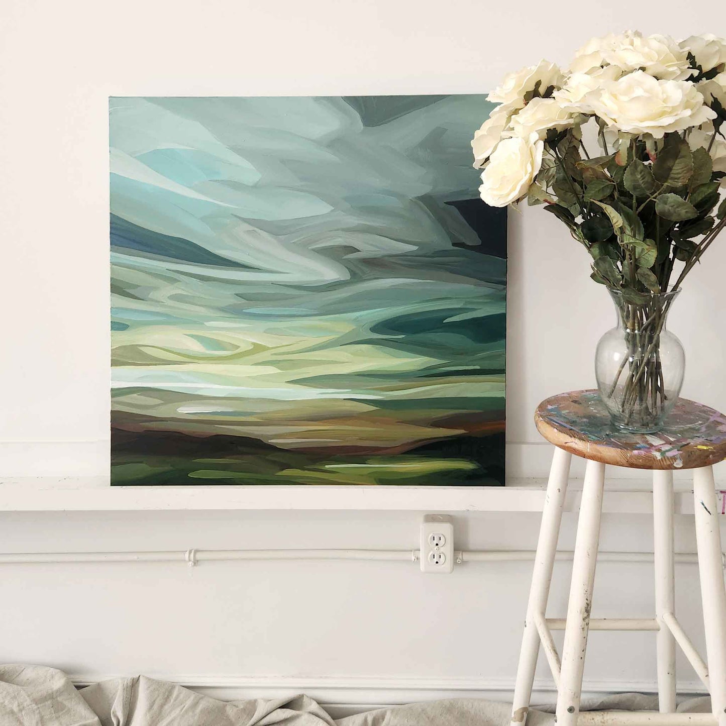 sea green abstract sky painting in studio