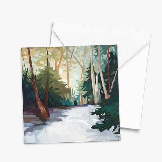 Winter art card featuring a snowy woodland landscape with sunlight through the trees