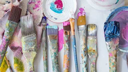 colorful paintbrushes in susannah bleasby's art studio