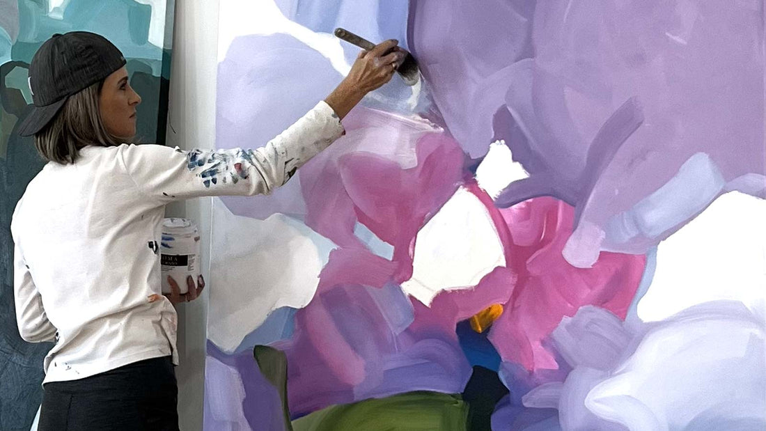 Canadian abstract artist Susannah Bleasby painting a large abstract painting on canvas