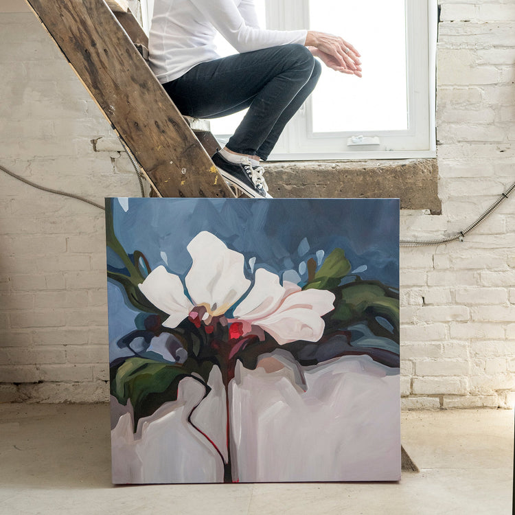 navy blue acrylic flower painting in the art studio of Canadian artist Susannah Bleasby