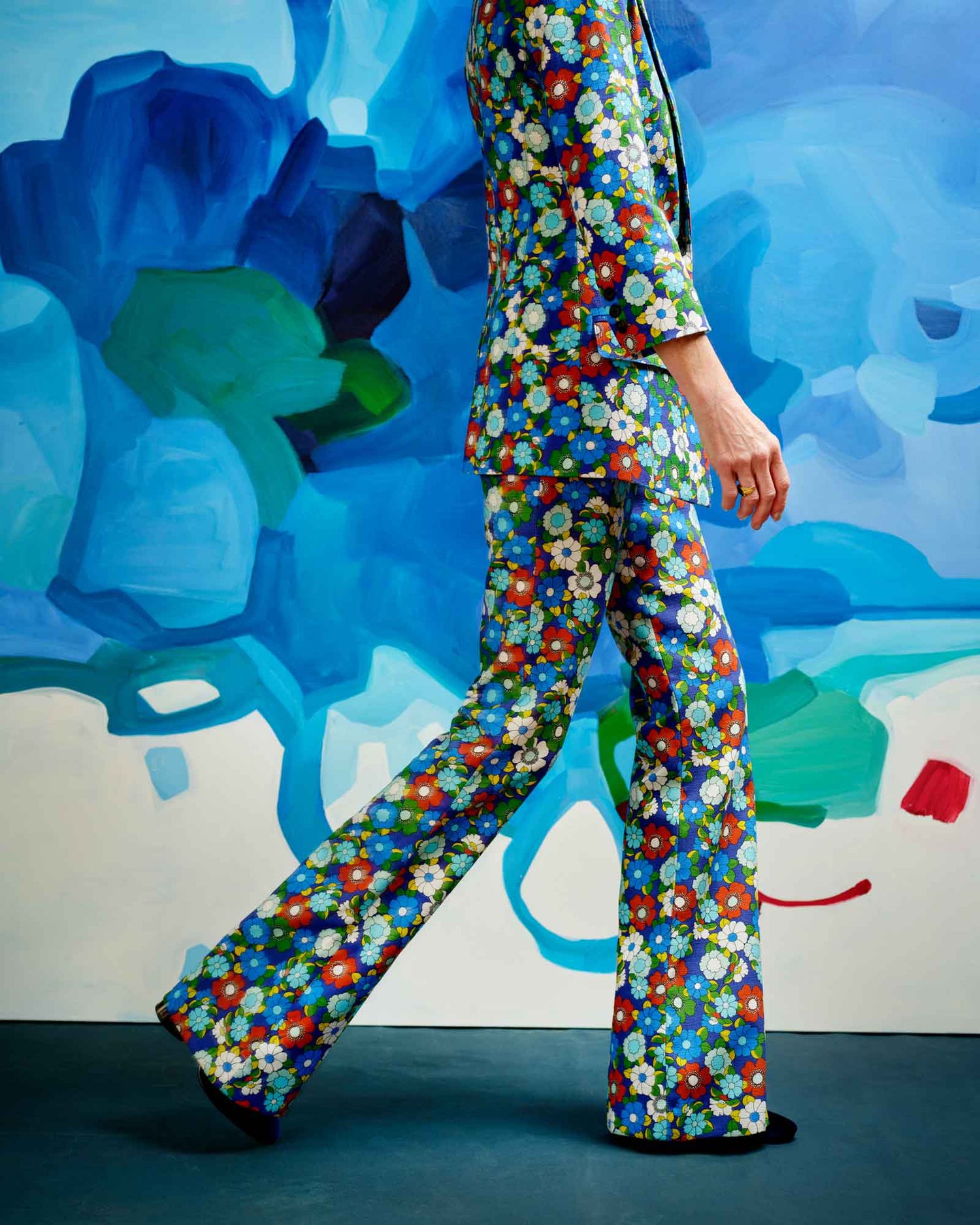 large-scale blue abstract painting and smythe floral suit