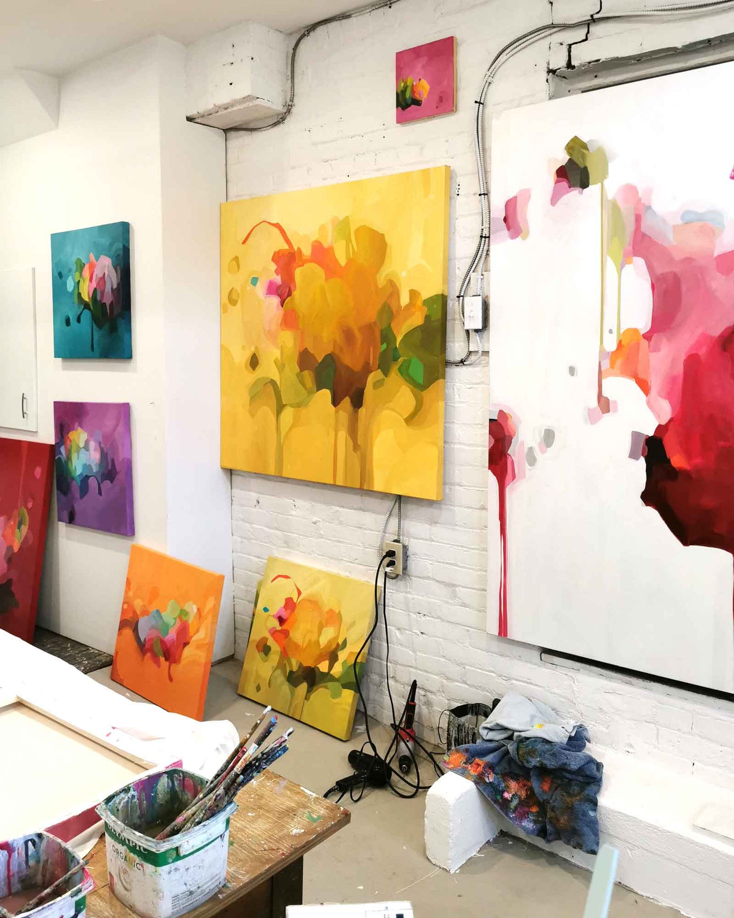 colorful abstract paintings in studio