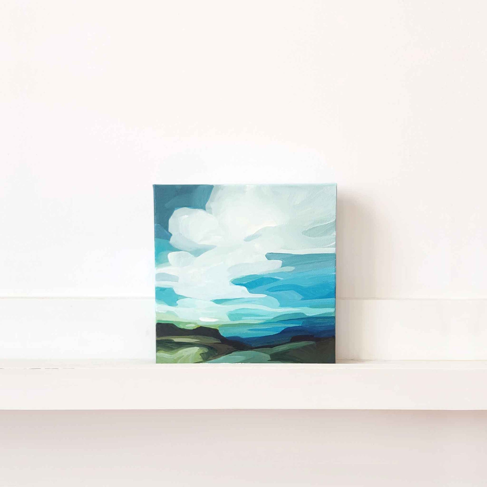 abstract landscape painting with white clouds floating in a blue sky