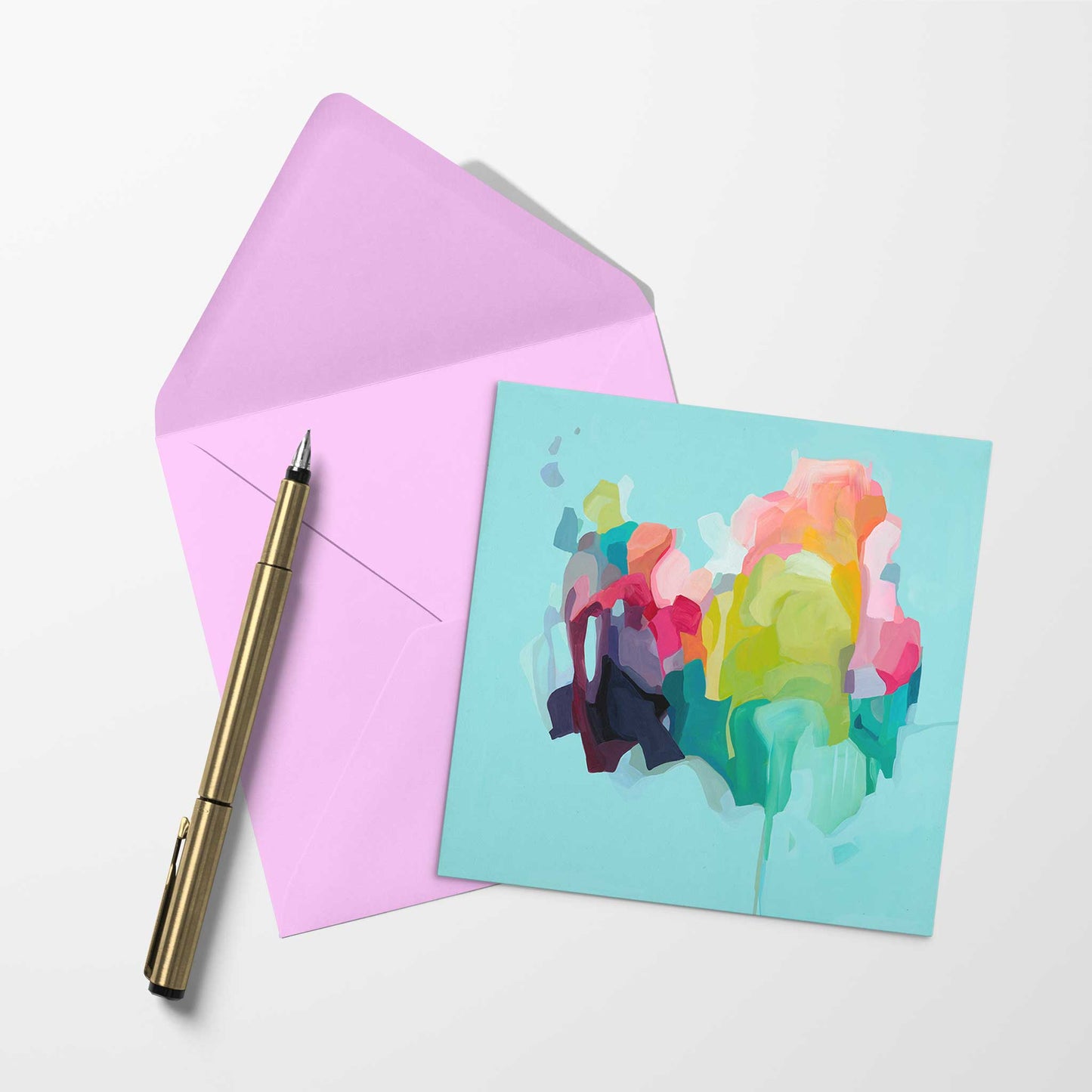 blank art card with aqua abstract artwork and pink envelope