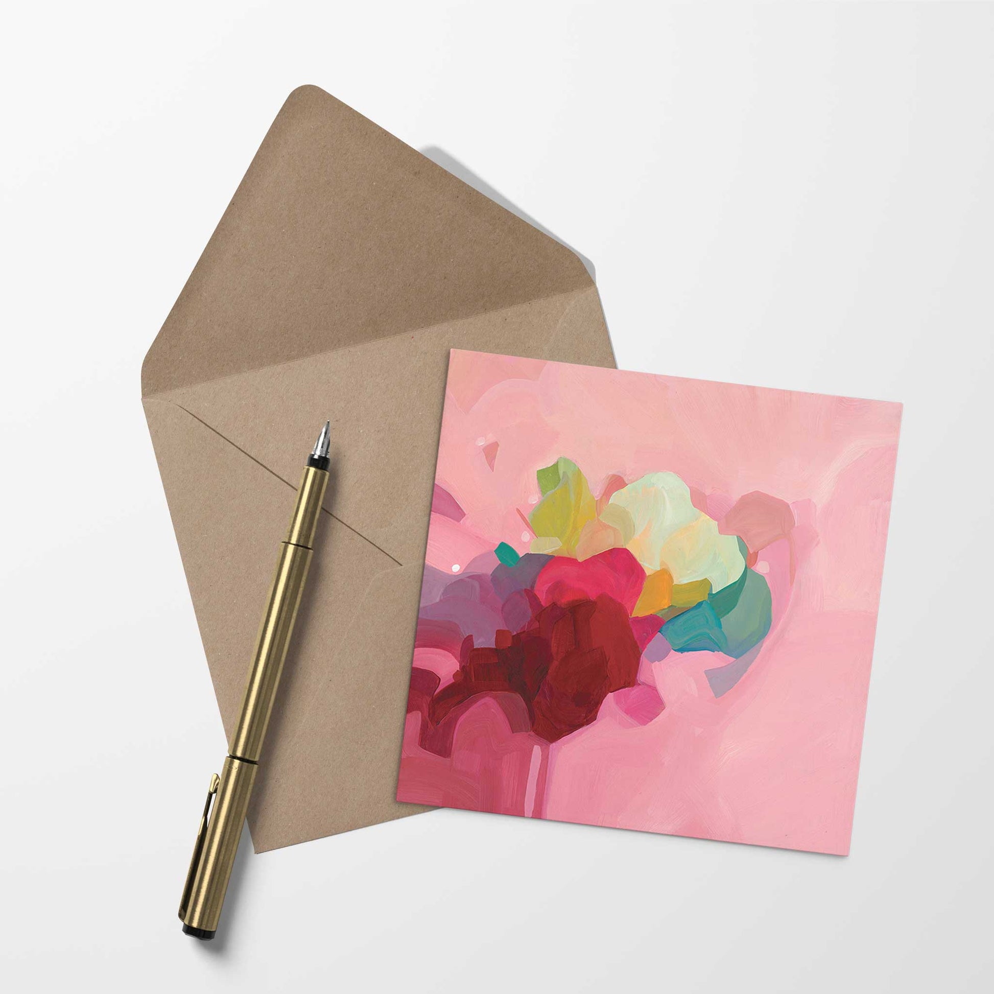 blank card with dusty rose abstract artwork and kraft envelope