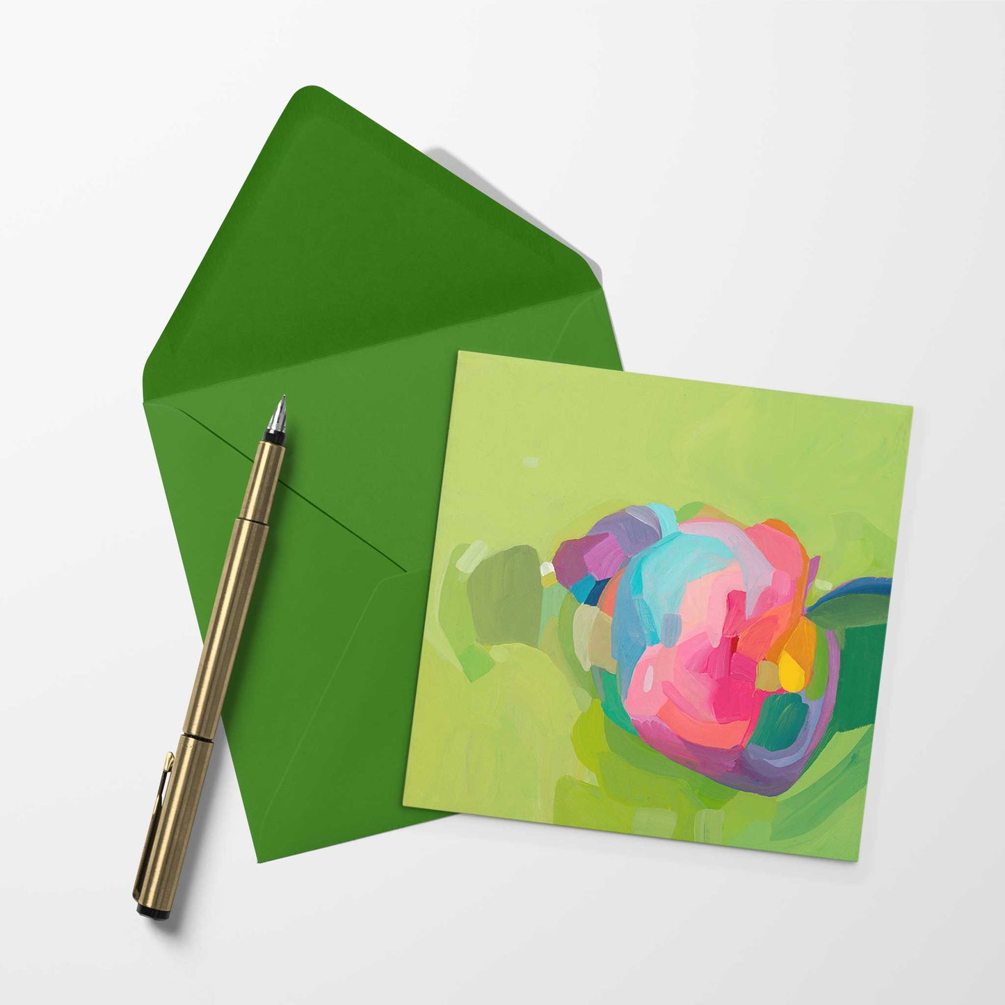 blank art card with green abstract artwork and matching green envelope