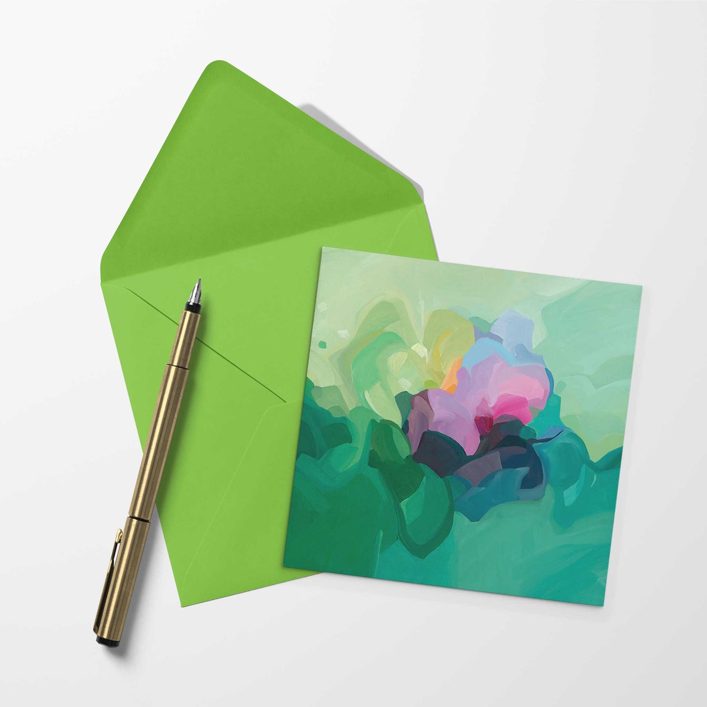 blank art card with jade green abstract artwork and lime green envelope