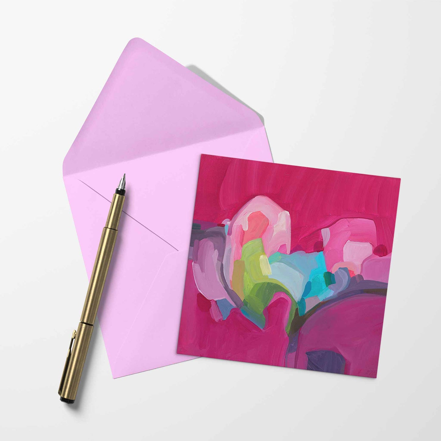 blank art card with magenta abstract artwork and pink envelope