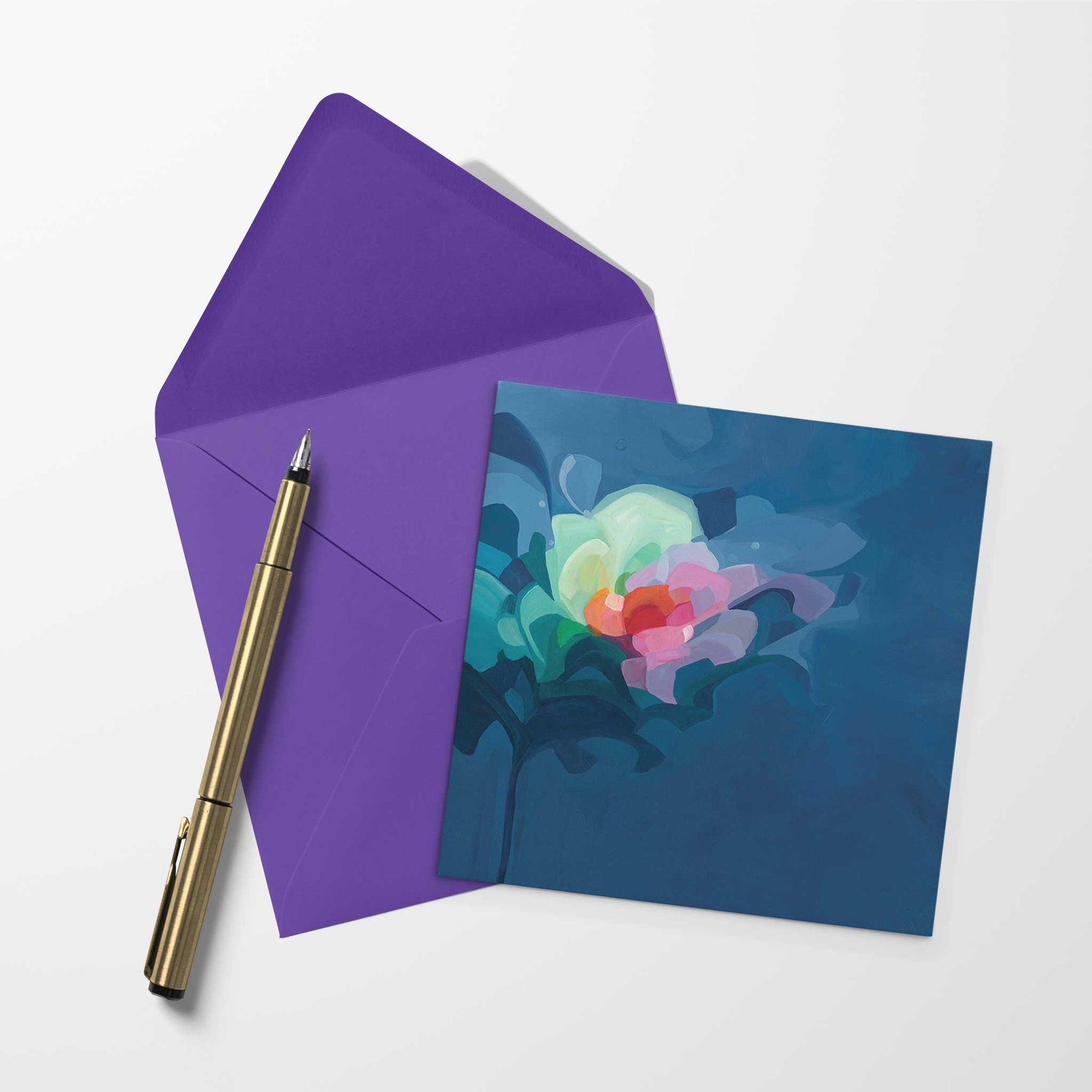 blank art card with navy abstract artwork and purple envelope