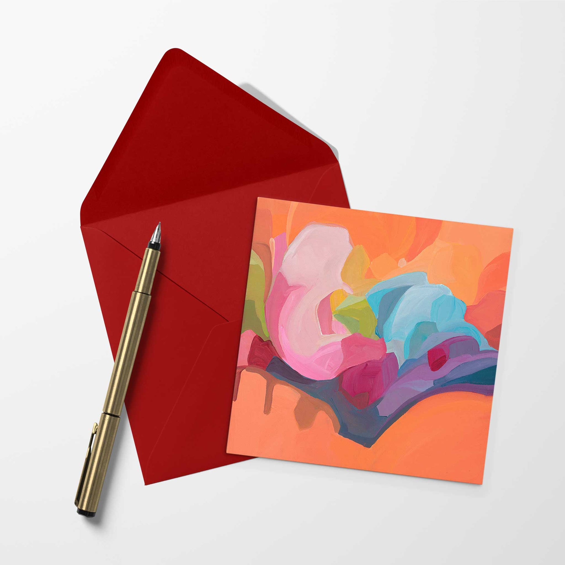 blank art card with orange abstract artwork and red envelope