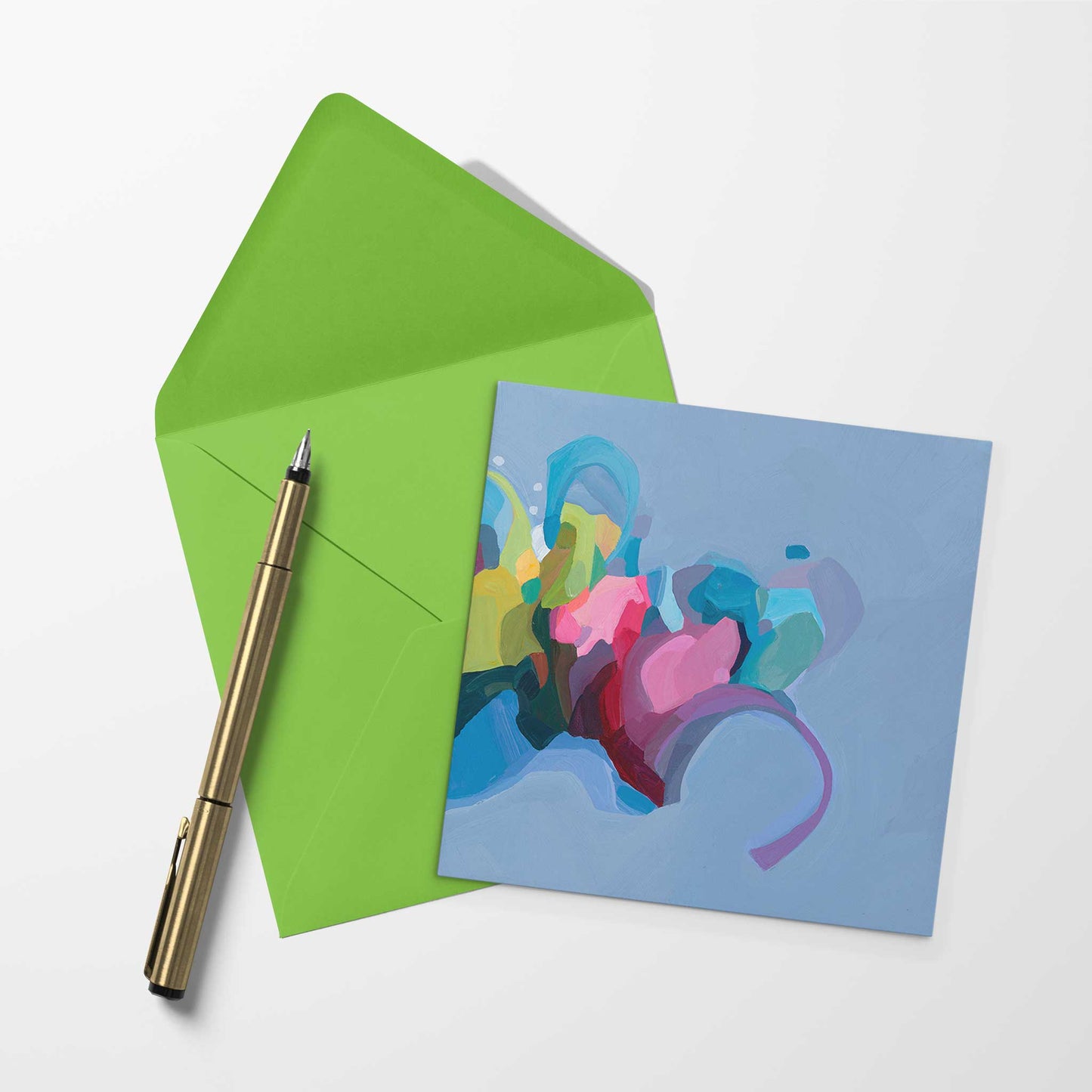 blank art card with periwinkle abstract artwork and lime green envelope