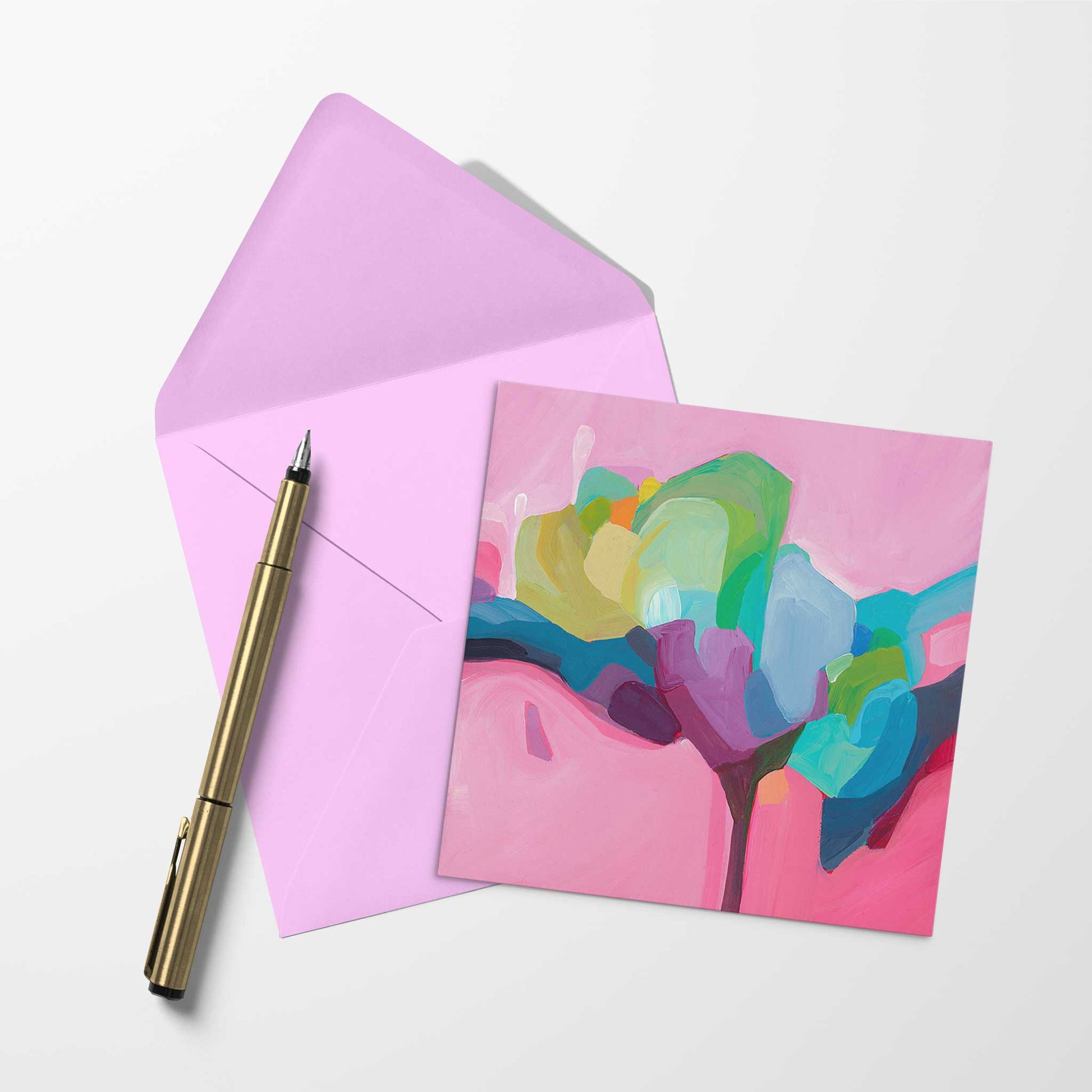 blank art card with pink abstract artwork and matching pink envelope