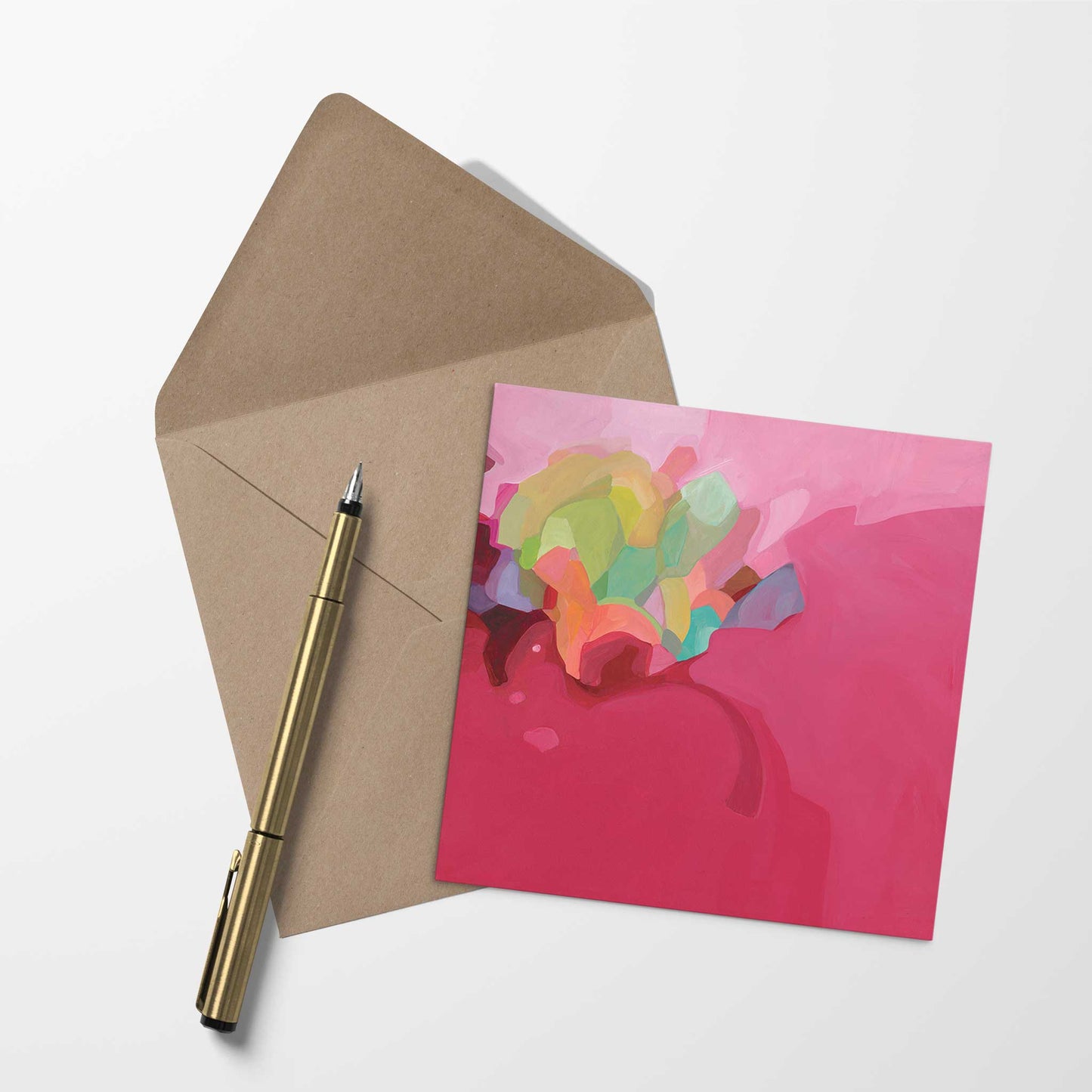 blank greeting card with red abstract artwork and kraft envelope