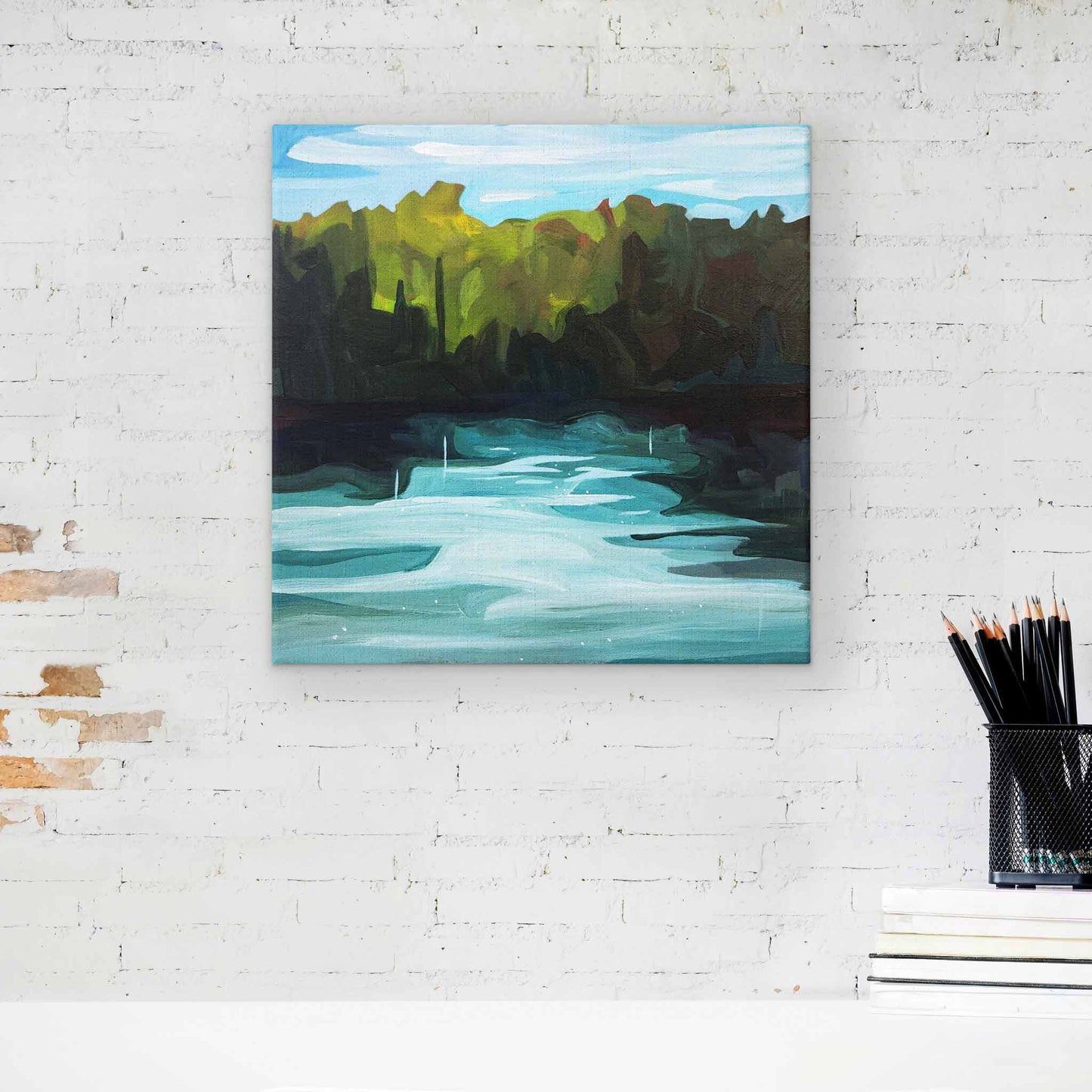 Small acrylic painting of an abstract forest landscape and lakeside view