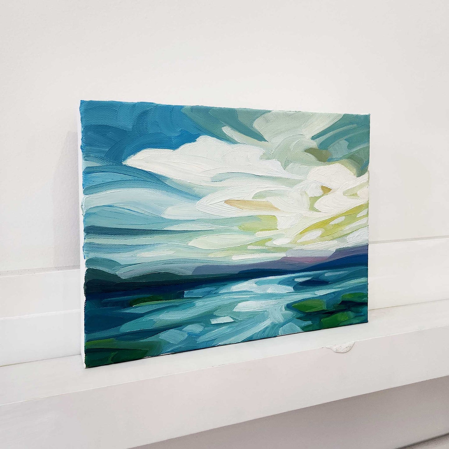 Contemporary abstract seascape with expressive colours and sweeping coastal forms.