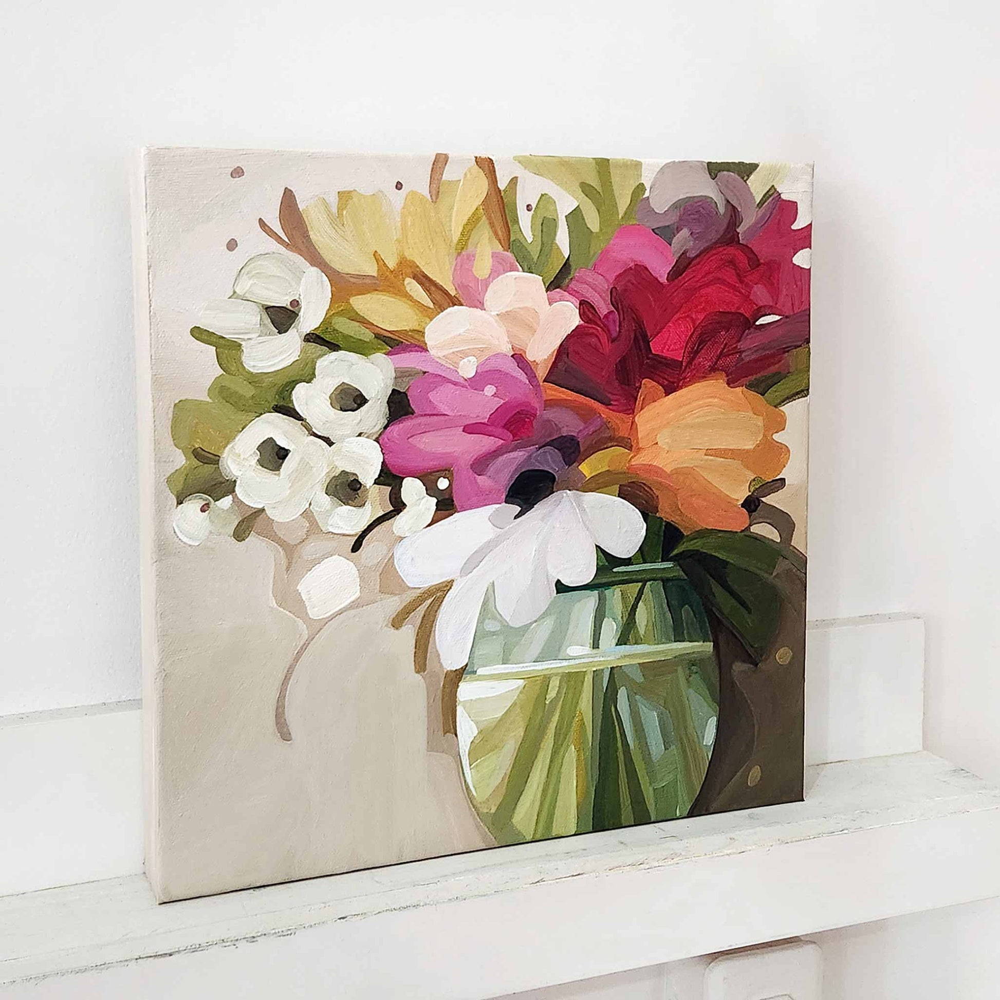 Floral canvas painting with soft cream, pink and vibrant red orange flowers