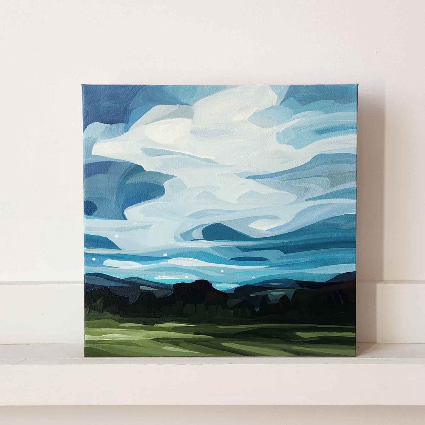 abstract landscape painting of a blue sky 