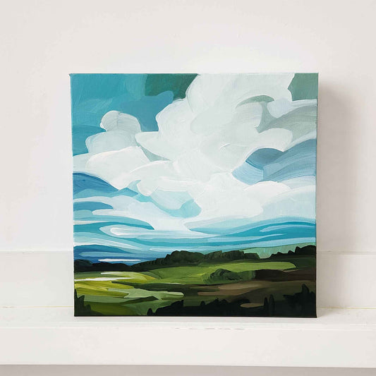 abstract landscape painting with bright blue summer sky over green fields