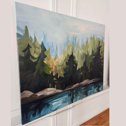 Experience the beauty and tranquility of nature with ‘Lake of the Woods’, an acrylic landscape painting of a quiet lake in the forest