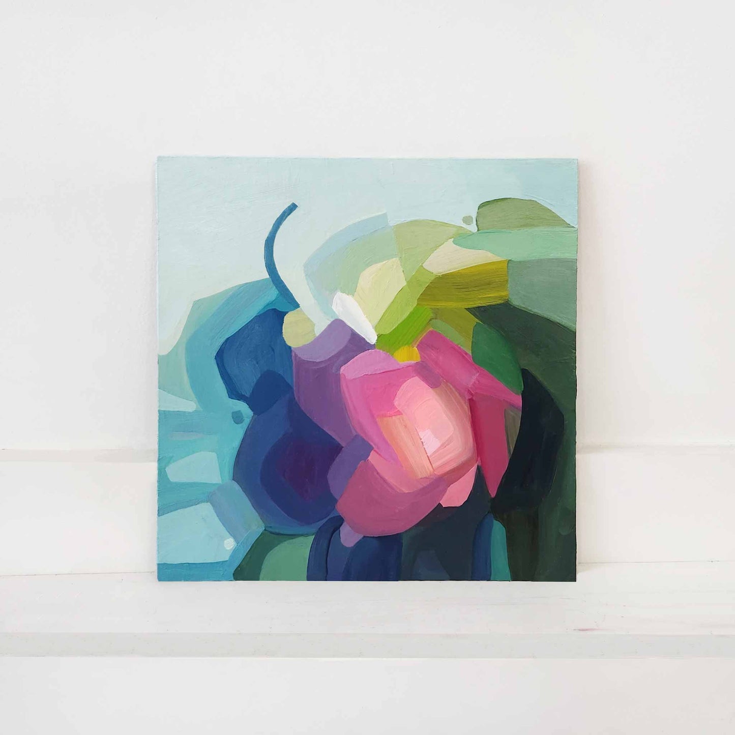 blue floral painting with pink abstract flower