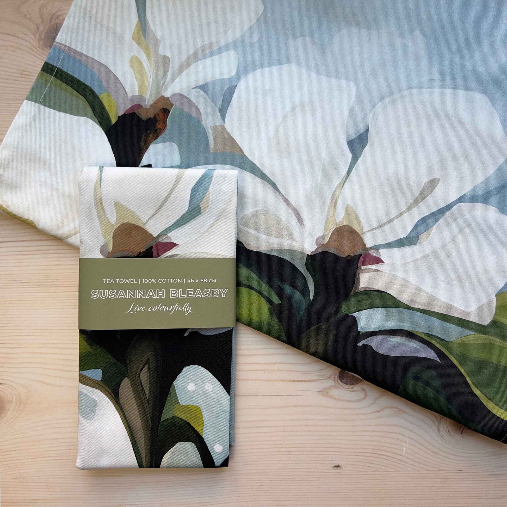 blue and white british made floral tea towel with abstract floral desing