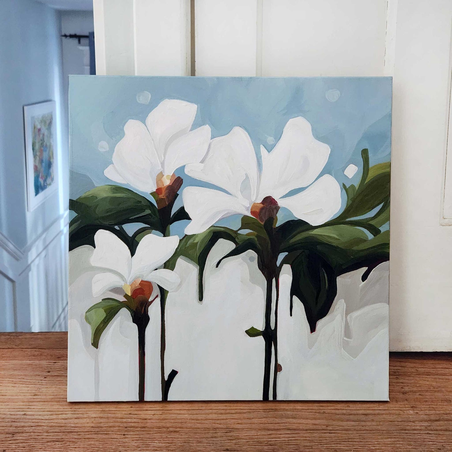 white flowr painting on light blue background