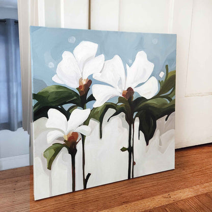 white flower painting on light blue canvas
