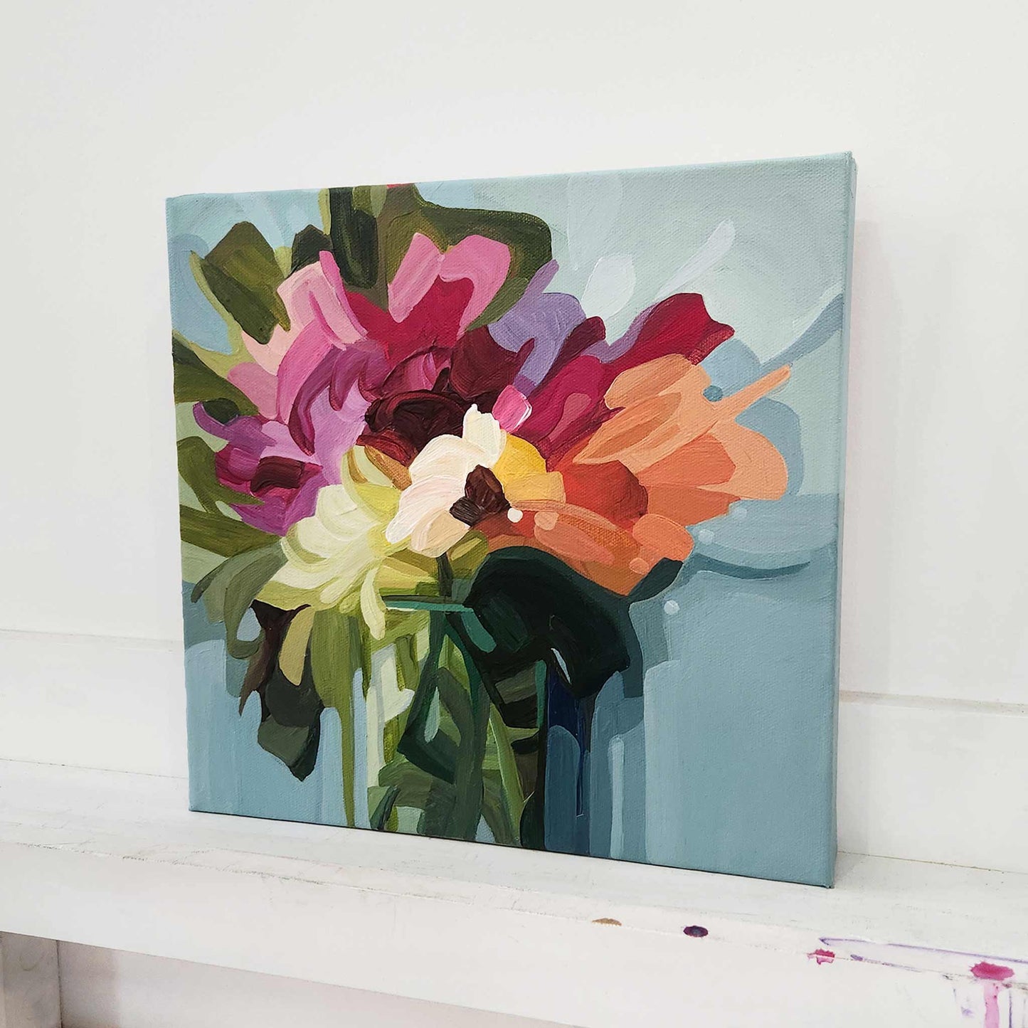 Original acrylic floral painting featuring vivid bouquet on pale aqua backdro