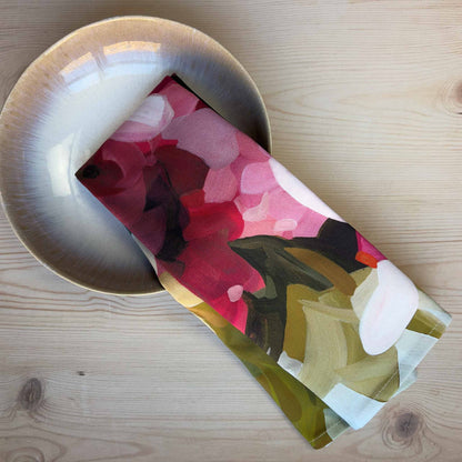 bright floral british made tea towel styled in a bowl