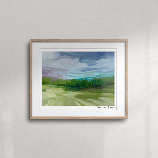Colourful evening landscape fine art print featuring a glowing sky, long shadows and a peaceful tree-lined countryside view.