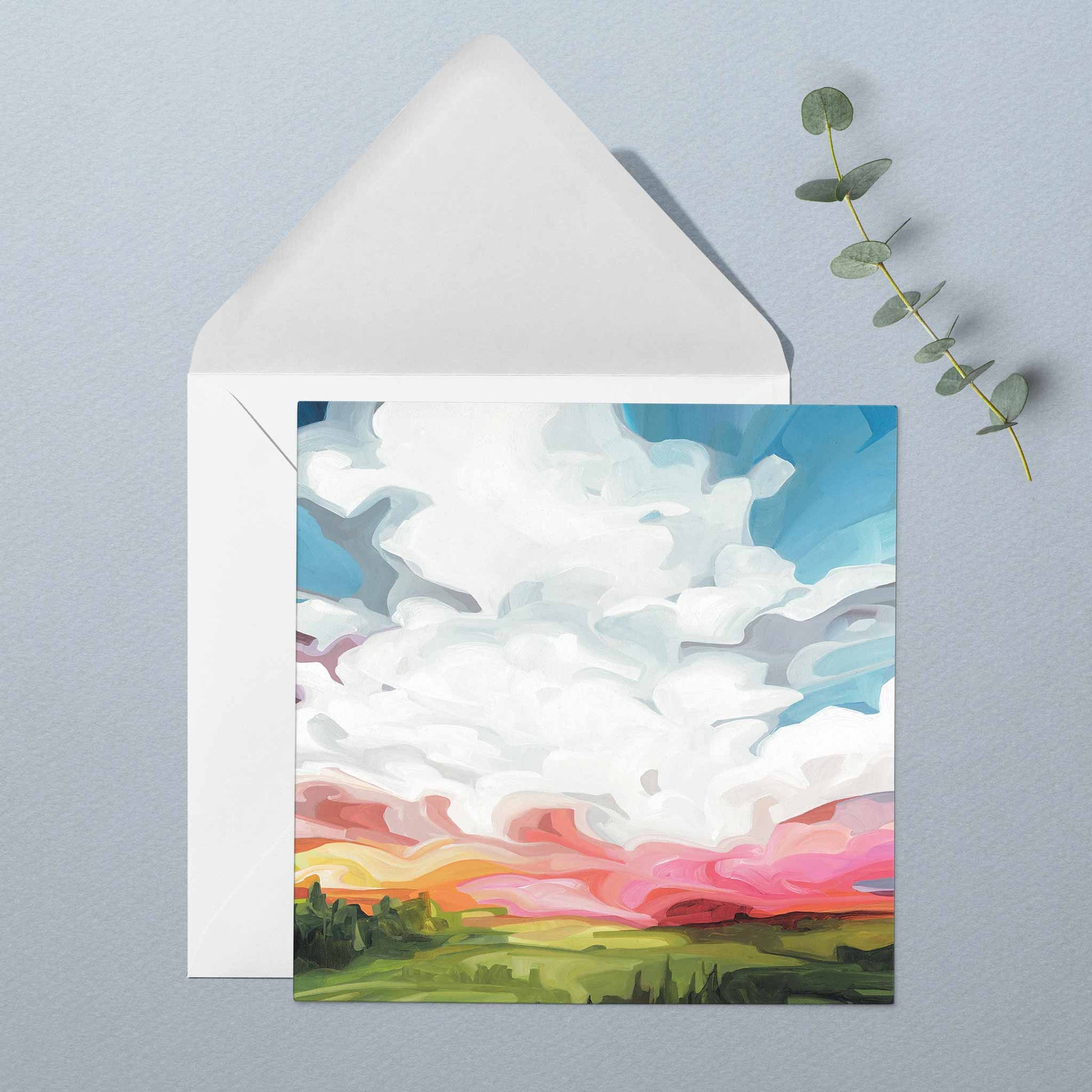 Colourful sunset sky greeting card with expressive clouds and glowing evening light