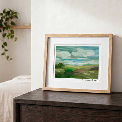 Contemporary countryside wall art featuring expressive brushstrokes, vibrant spring fields and a cloud-filled blue sky