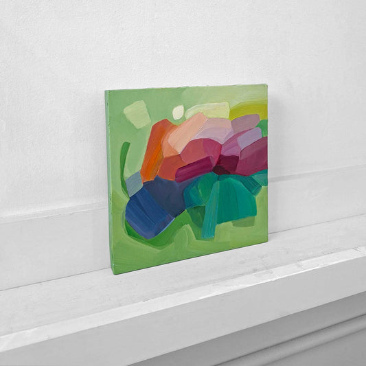 original abstract oil painting with floral inspired shapes on a fresh green background