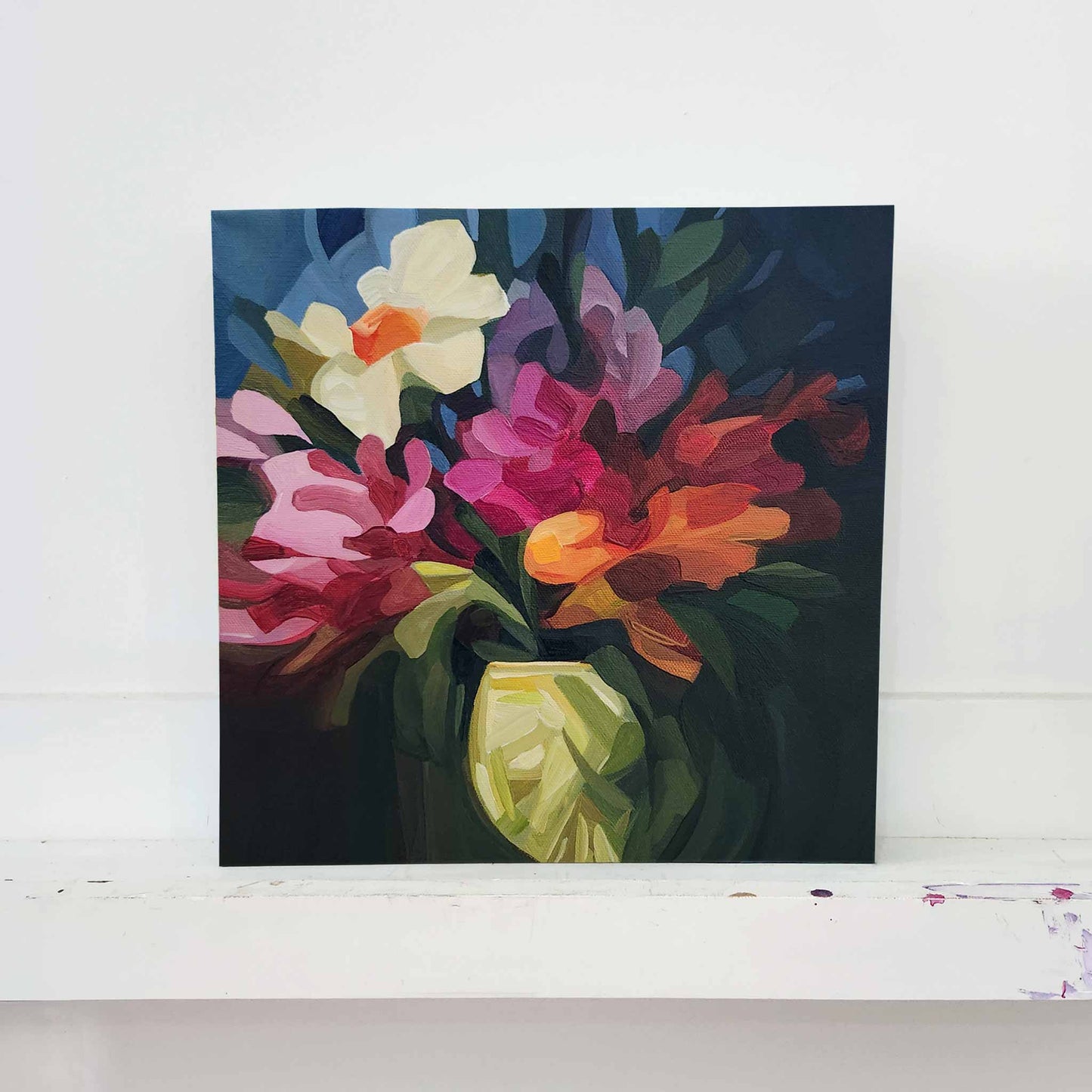 Abstract floral painting with vibrant bouquet on navy blue background