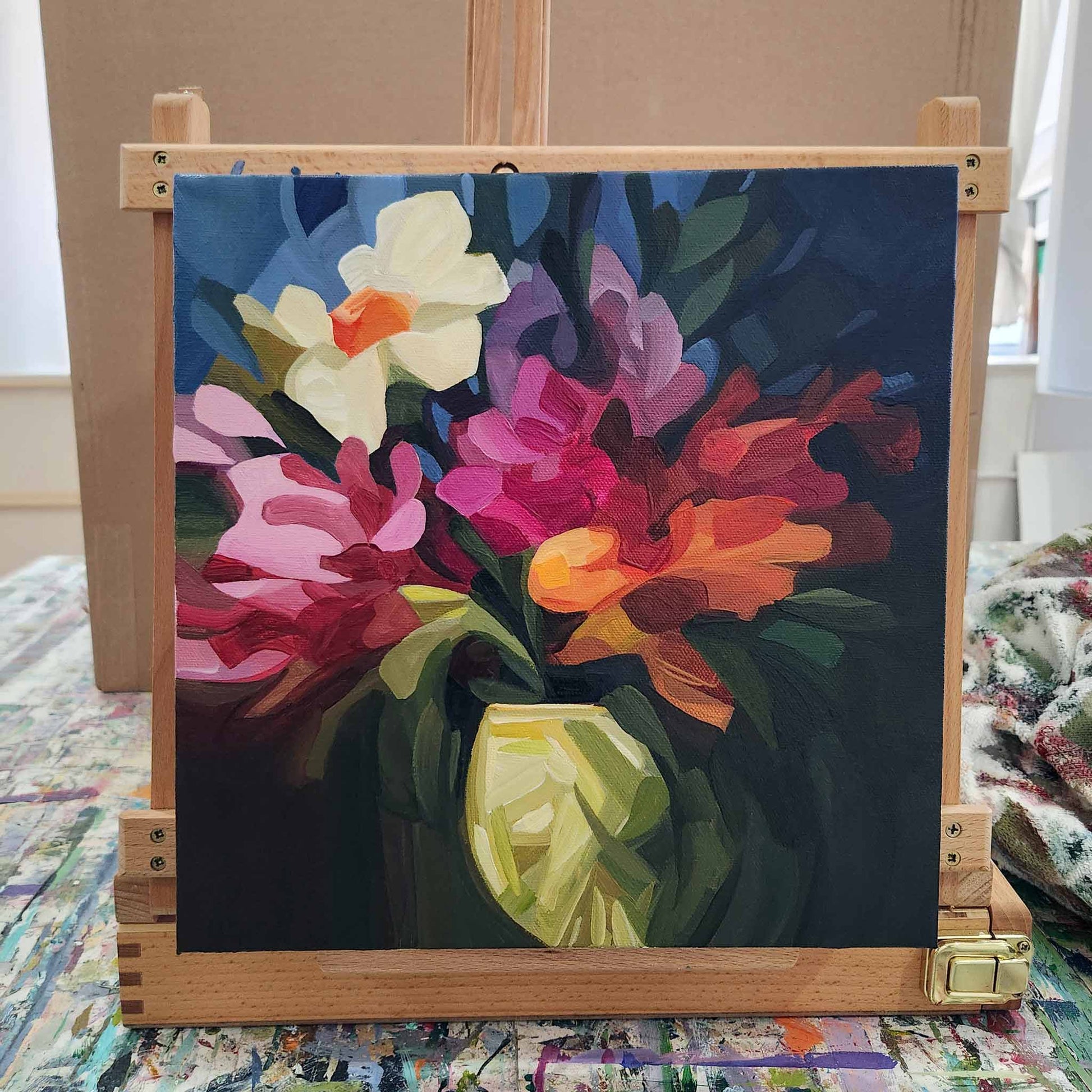 Contemporary floral painting with vivid flowers on navy blue background