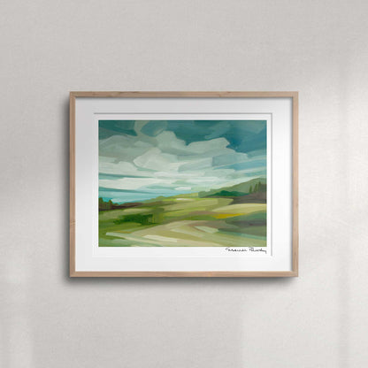 Countryside landscape fine art print featuring rolling hills, soft cloud shadows and a colourful open sky.