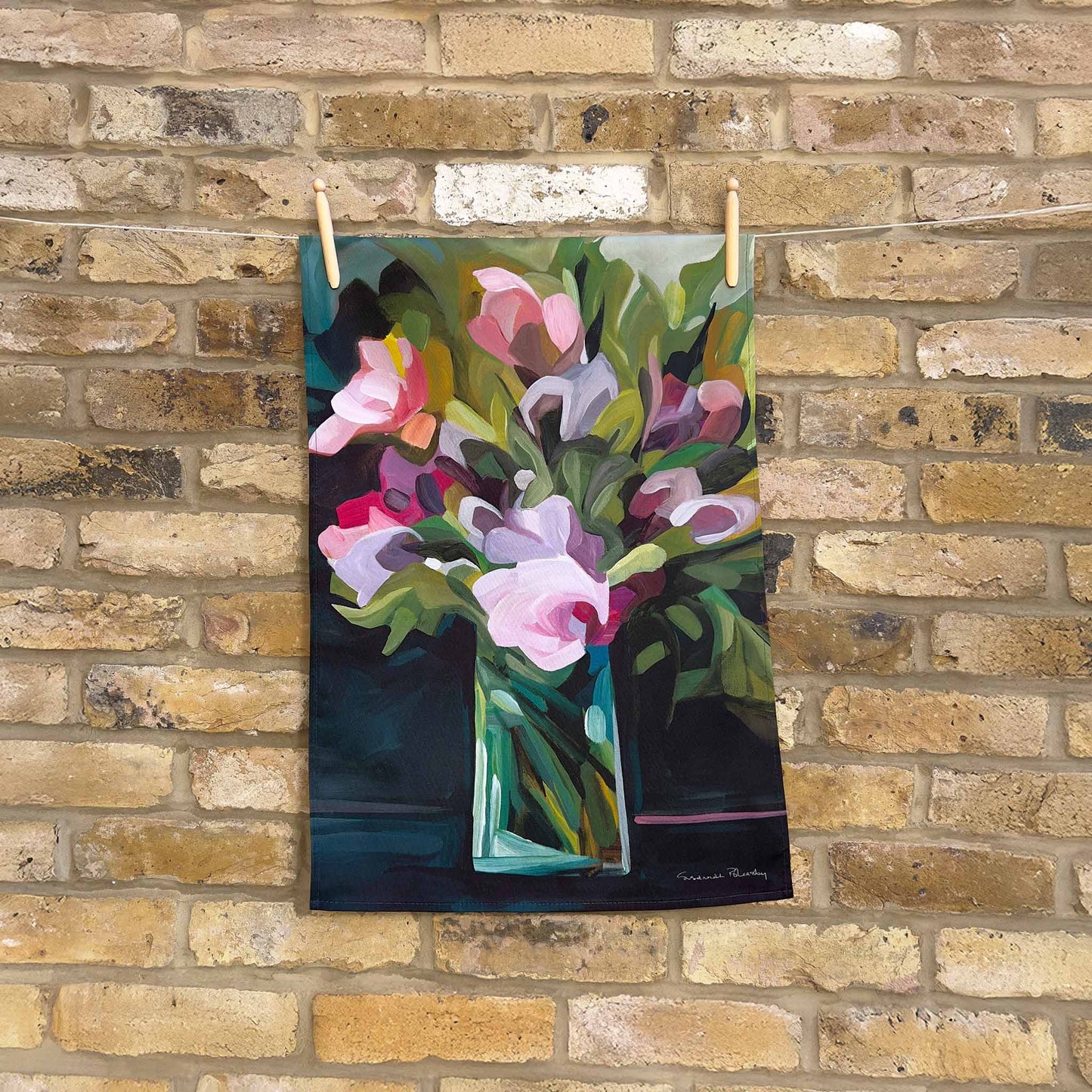 cotton tea towel with purple floral design