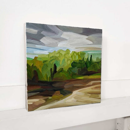 original oil painting on panel of a spring forest landscape with brown fields and a grey mauve sky