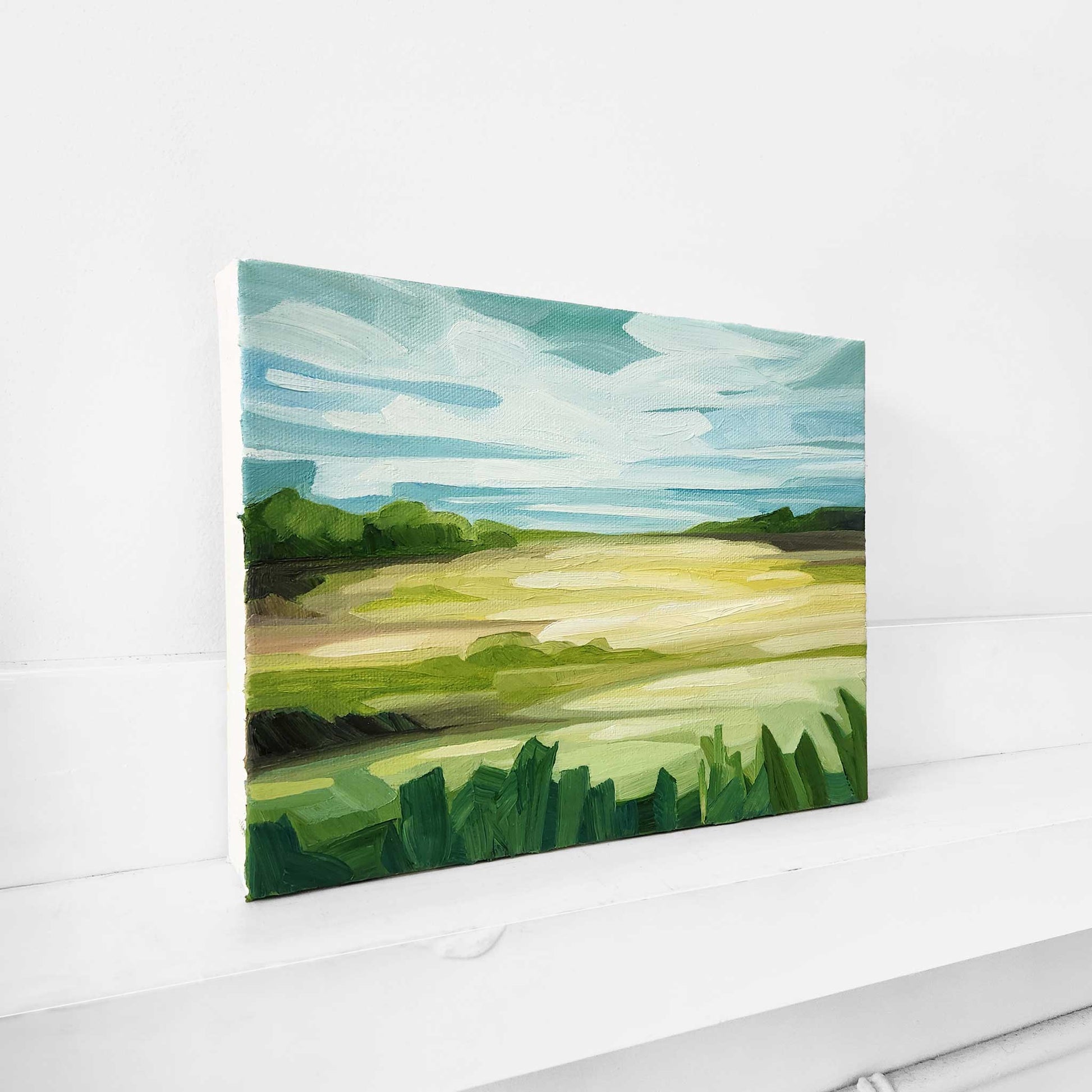 Colourful oil painting of rolling green fields in the summer sunshine.