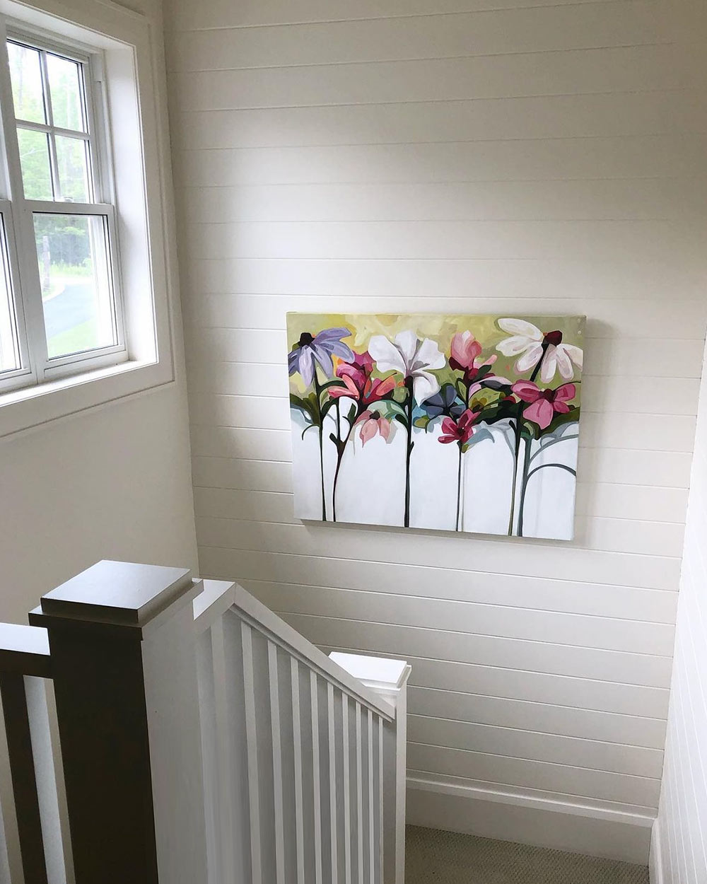 horizontal flower painting in staircase