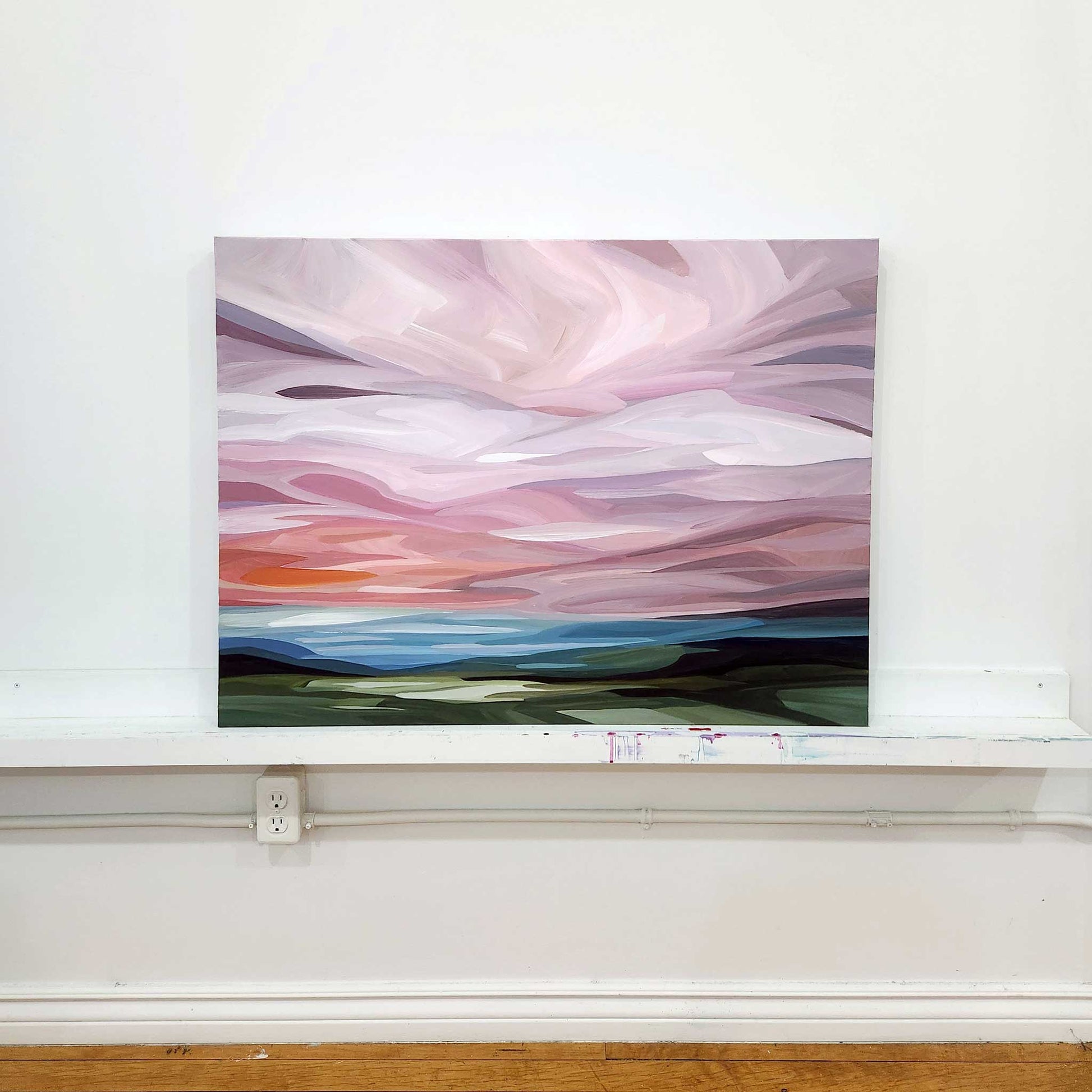 horizontal painting of a pink abstract sky