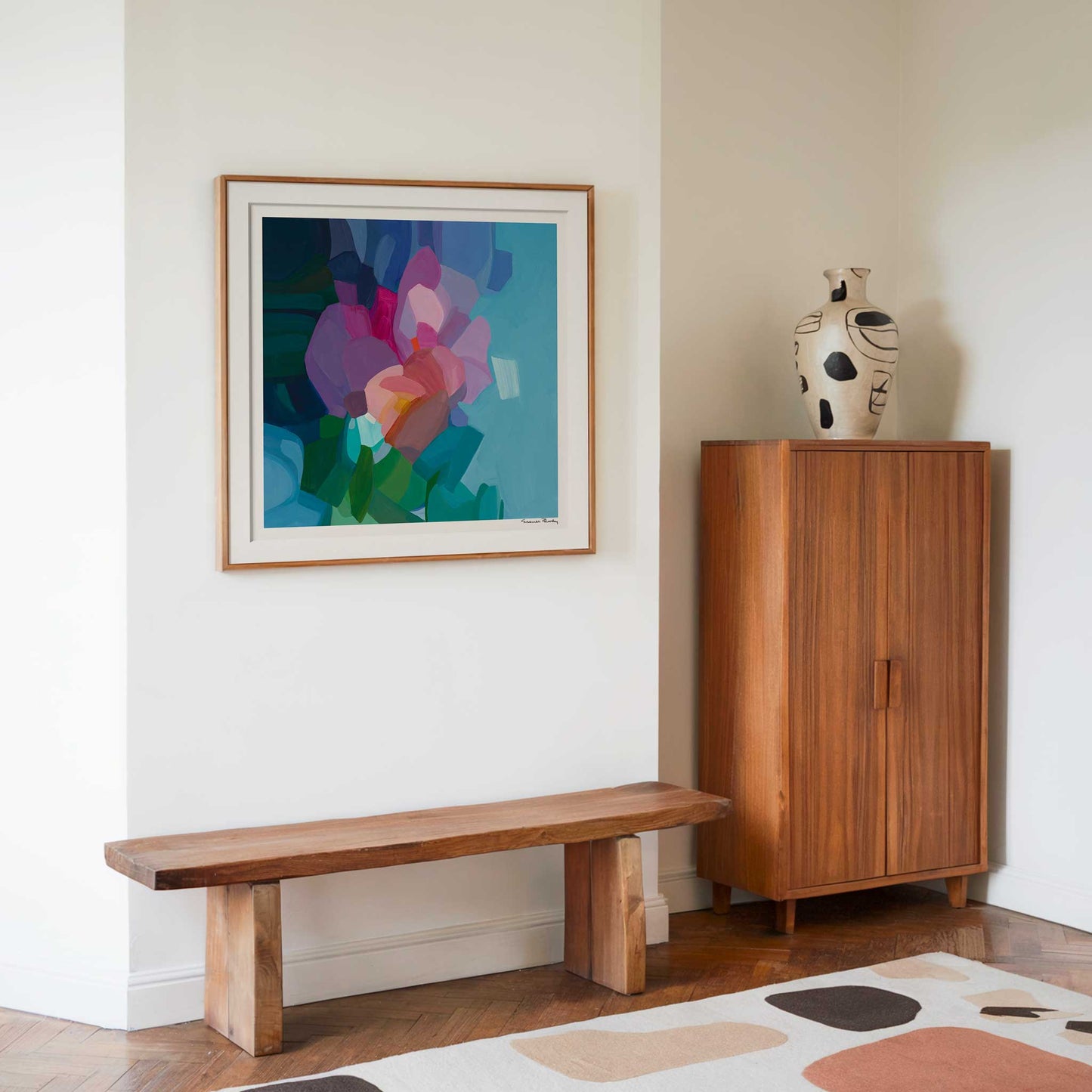 jumpstart blue abstract wall art in hallway