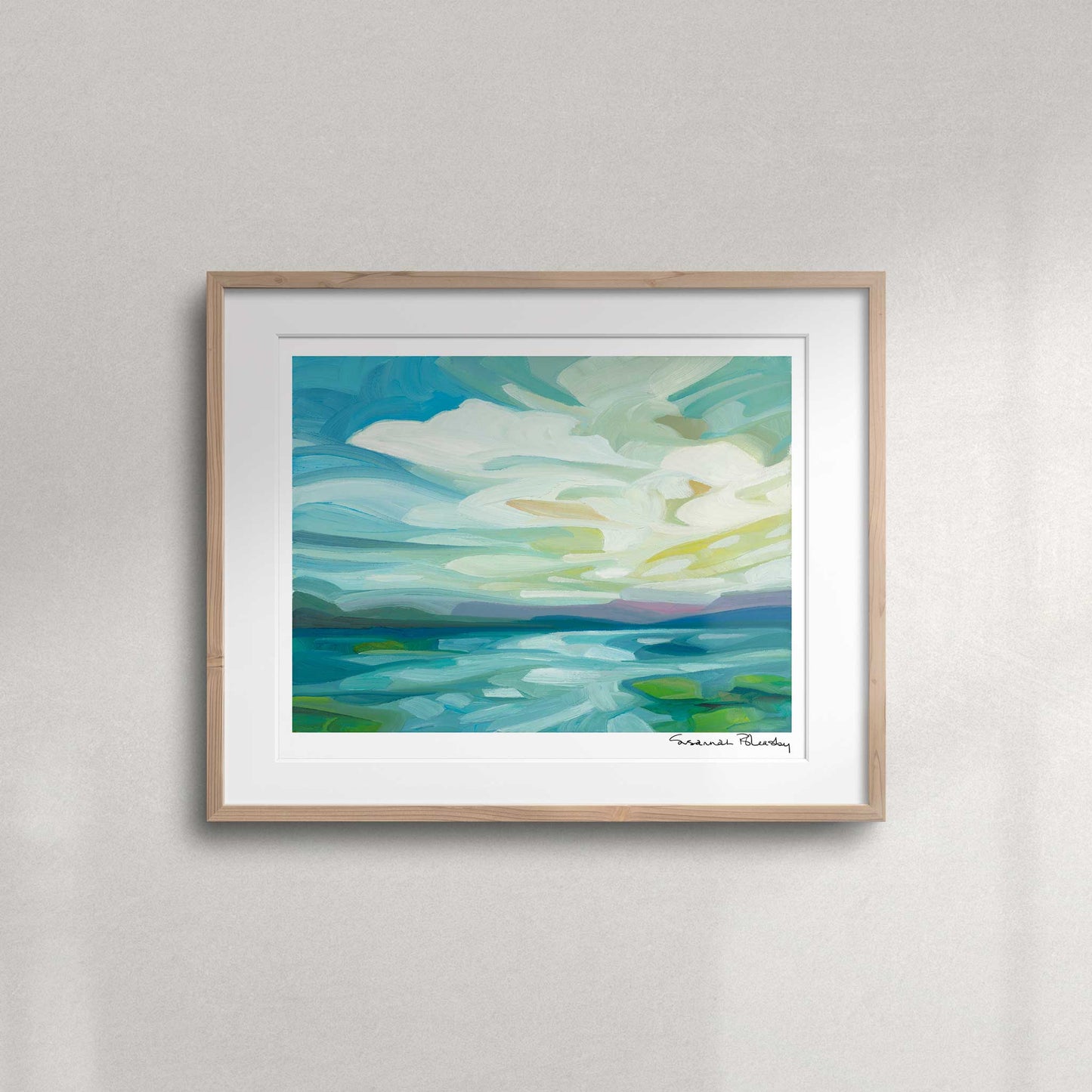 Lake and sky landscape fine art print featuring billowing clouds, beams of light and colourful spring reflections on the water