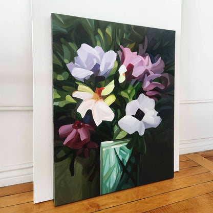 statement floral painting with purple blooms on a green background